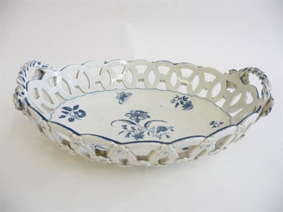 Lot 210 - A First Period Worcester Porcelain Oval Basket, circa 1770, with rope twist handles and pierced...