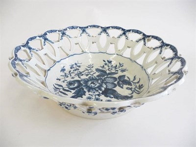 Lot 211 - A First Period Worcester Porcelain Circular Basket, circa 1775, printed in underglaze blue with the