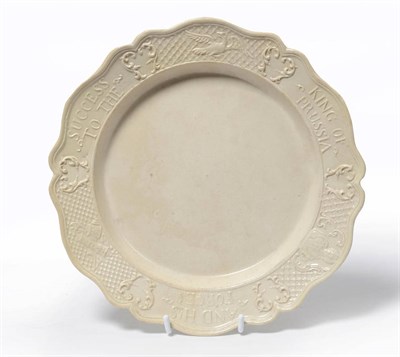 Lot 218 - A Staffordshire White Saltglazed Stoneware King of Prussia Plate, circa 1757, of silver shape,...