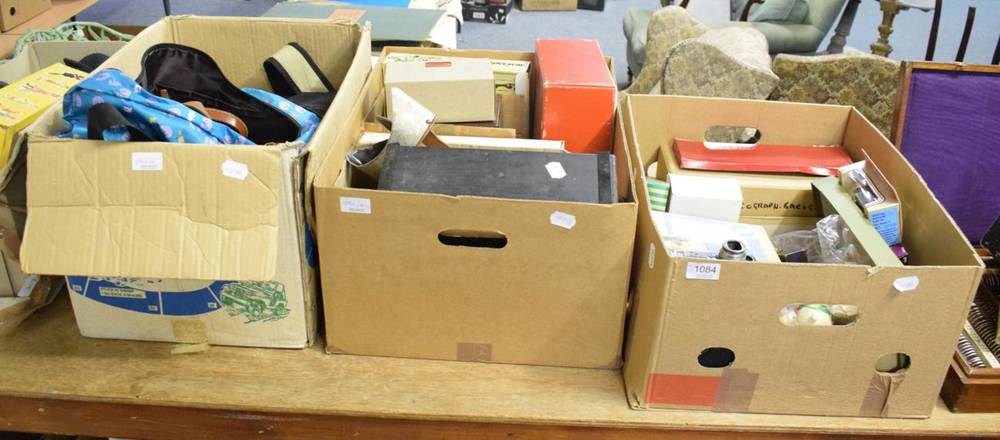 Lot 1084 - Four boxes including Victorian slide viewer; microscopes; topographical slides; puppets;...