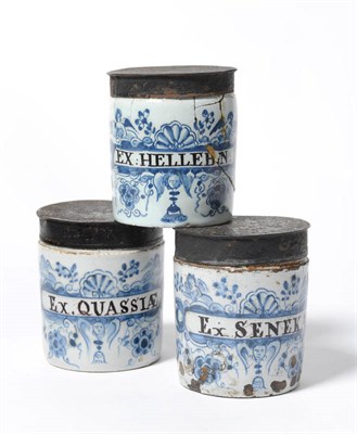 Lot 221 - A Set of Three English Delft Cylindrical Drug Jars, probably London, circa 1750-70, painted in blue