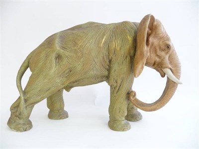 Lot 222 - A Royal Dux Style Porcelain Figure of an Elephant, early 20th century, standing four square...