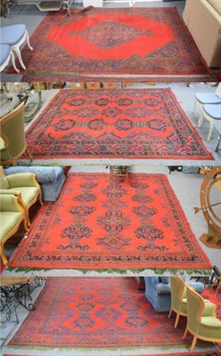 Lot 1182 - Ushak Carpet, the tomato field with columns of guls enclosed by slant leaf and rosette borders, 341