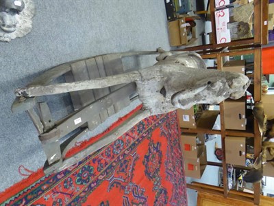 Lot 1184 - A carved rocking horse, circa 1900, in need of restoration