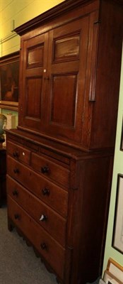 Lot 1199 - George III oak linen press with secret drawer