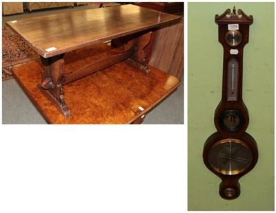 Lot 1204 - An oak wheel barometer and an oak coffee table, possibly Titchmarsh and Goodwin (2)