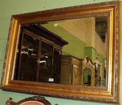 Lot 1208 - A gilt framed rectangular mirror
