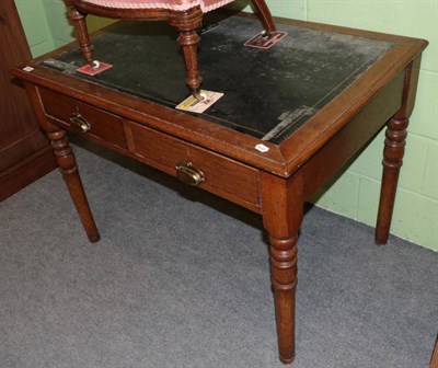 Lot 1210 - Late Victorian oak writing table, fitted two drawers, 106cm by 73cm by 77cm high