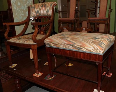 Lot 1222 - Edwardian inlaid armchair with upholstery and mahogany footstool with similar upholstery (2)