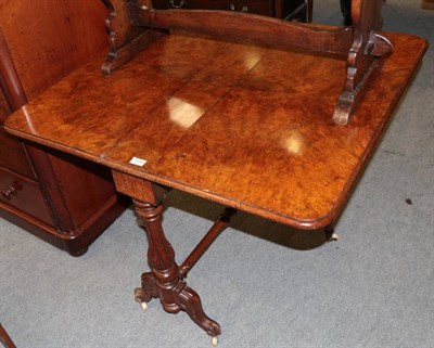 Lot 1230 - A Victorian burr walnut veneered drop leaf table