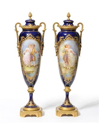 Lot 233 - A Pair of Gilt Metal Mounted Sevres Style Slender Baluster Vases and Covers, circa 1890, with...