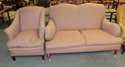Lot 1246 - A two piece suite comprising of a two seater sofa and an armchair