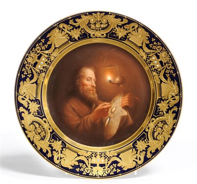 Lot 235 - A Vienna Porcelain Cabinet Plate, circa 1880, painted by Wagner with a bearded man reading a...