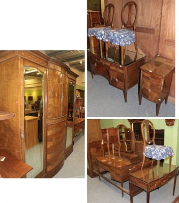Lot 1274 - A bedroom suite comprising a dressing table, wardrobe, bedside cabinet, three chairs, two...
