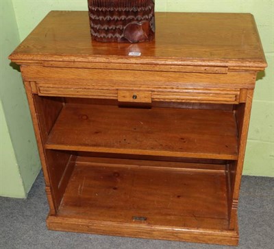 Lot 1286 - An early 20th century oak tambour fronted cabinet fitted with a shelf