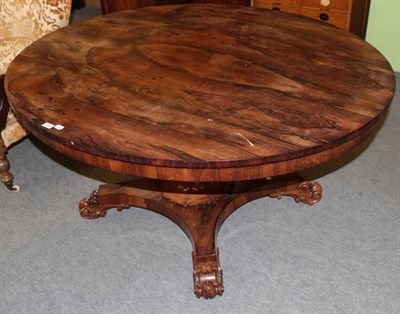 Lot 1296 - Early Victorian rosewood oval table, on carved claw feet