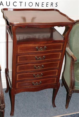 Lot 1299 - An Edwardian Art Nouveau mahogany music cabinet, with stylised brass and copper handles