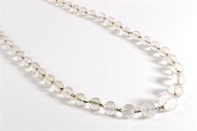 Lot 7 - A Rock Crystal Bead Necklace, the faceted graduated beads with metal links, length 88cm...