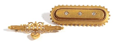 Lot 25 - A Victorian Brooch, of oblong form with beaded outer edge and plaited hair encased, length 5cm...