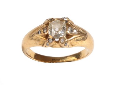 Lot 26 - A Diamond Ring, an old mine cut diamond held in six yellow claws, each inset with two rose cut...