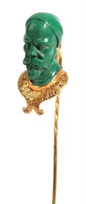 Lot 42 - A Malachite Stick Pin, the malachite carved as the head of a bearded gentleman, over a collar