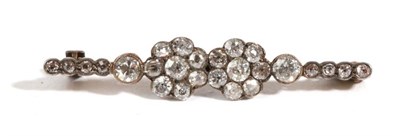 Lot 43 - A Diamond Set Bar Brooch, comprised of two old cut diamond cluster set side-by-side, to a row...