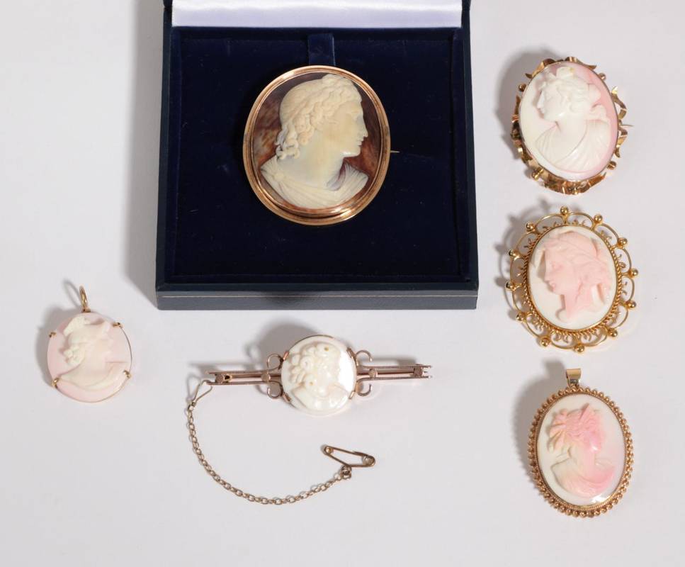 Lot 53 - Five Cameo Brooches, one depicting Apollo in an oval frame, measures 4.2cm by 5.2cm, four other...