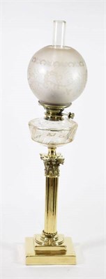 Lot 65 - A Brass Corinthian Column Oil Lamp, late 19th/early 20th century, with etched globe, cut glass...