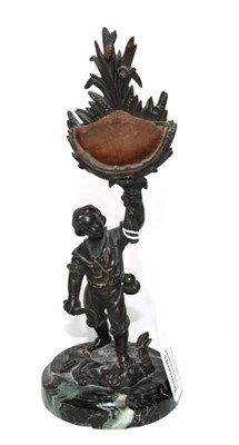 Lot 94 - ~ A Bronze Figure of a Boy, on a green marble base, 21.5cm high