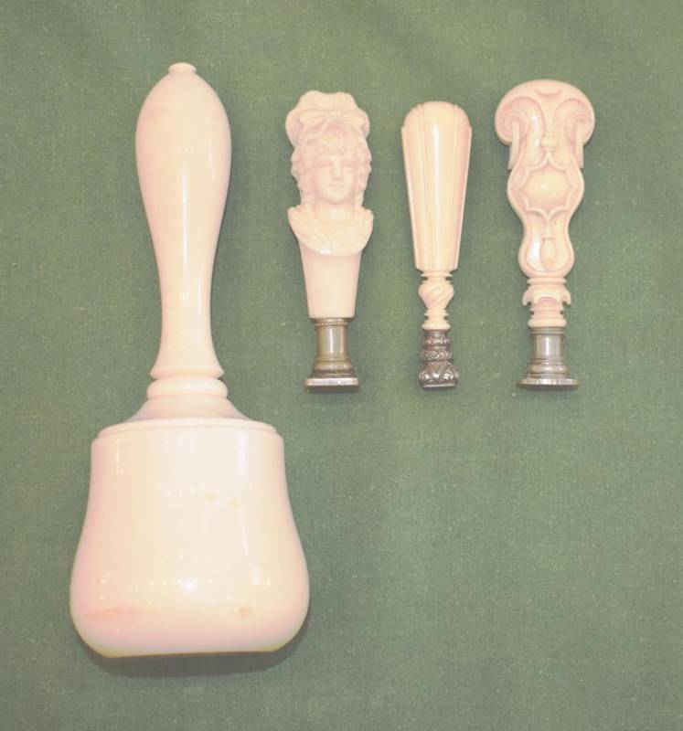 Lot 106 - A Dieppe Ivory Hand Seal, 19th century, carved with the bust portrait of a lady, with steel matrix