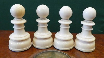 Lot 107 - An English Stained and Natural Ivory Chess Set, early 19th century, kings 12cm high in a...