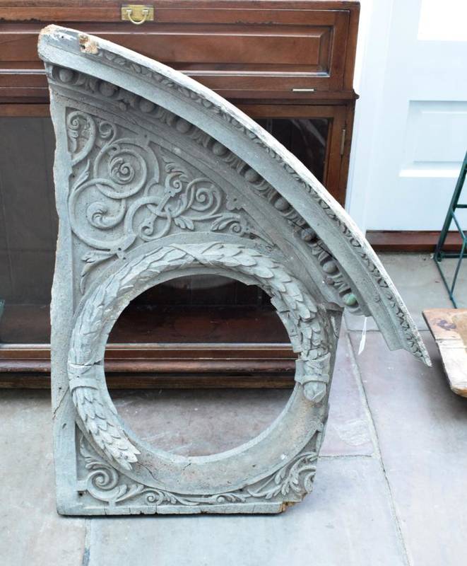 Lot 119 - A Carved Walnut Pediment Fragment, probably 17th century, of broken arch form carved with a...
