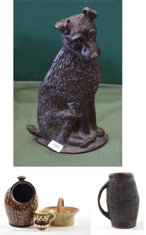 Lot 128 - ^ A Cast Iron Door Stop, early 20th century, as a seated terrier, 39cm high; A Treen Barrel...