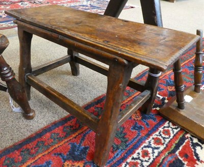 Lot 131 - ^ An Oak Small Stool, 18th century, on turned legs tied by a stretcher, 41.5cm wide; and Two...