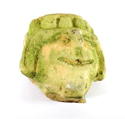 Lot 134 - A Carved Stone Head, in Medieval style, wearing a crown, 22cm high