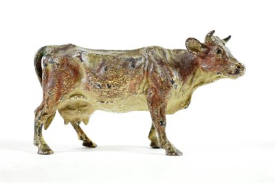 Lot 138 - An Austrian Cold Painted Bronze Figure of a Cow, early 20th century, naturalistically modelled...