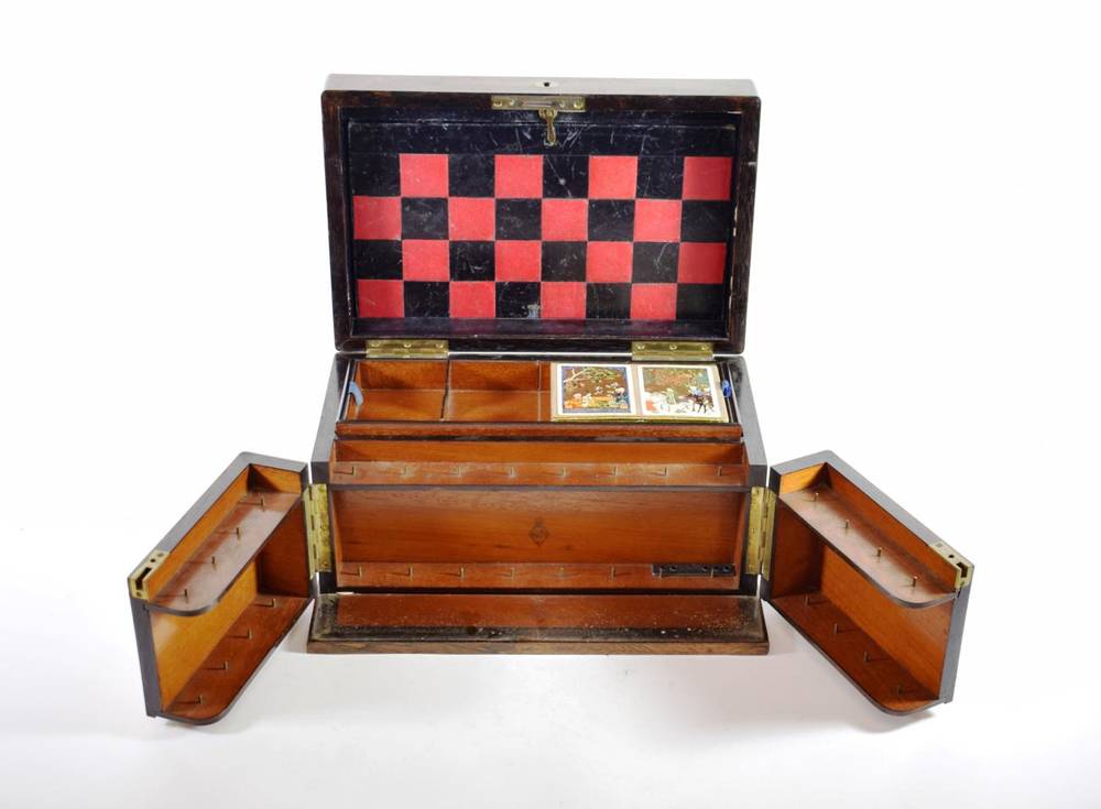 Lot 148 - A Victorian Brass Bound Rosewood Games Compendium, with lift-out trays containing bone dominos...