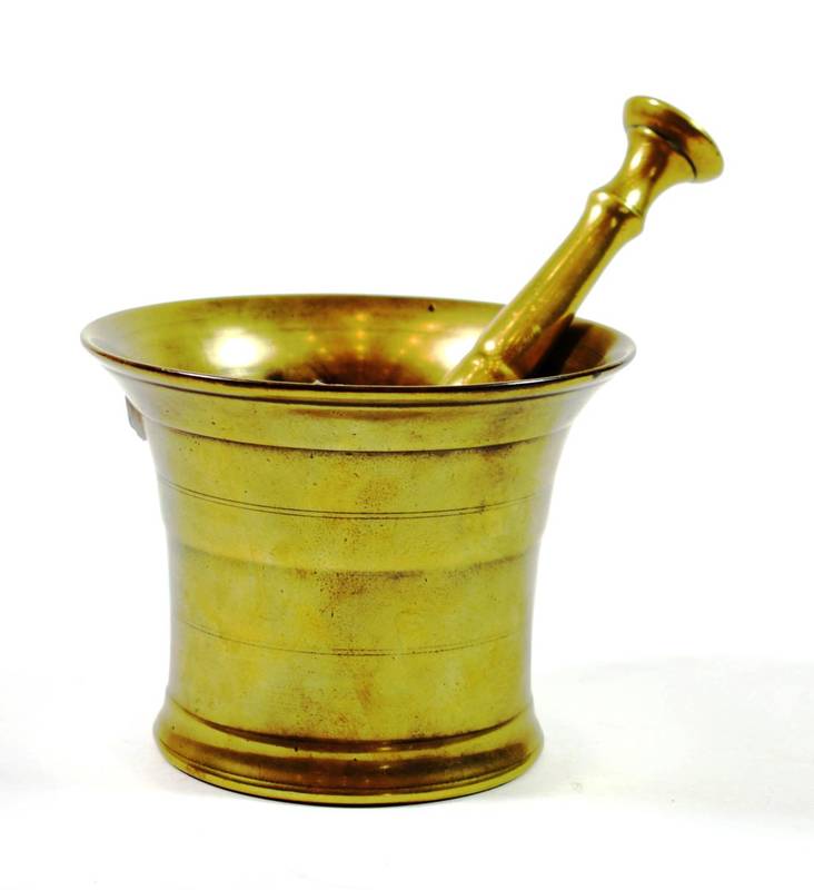 Lot 153 - A Dutch Brass Pestle and Mortar, 18th century, of ribbed form, mortar 12cm high