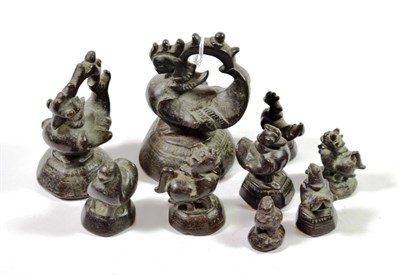 Lot 169 - Nine Various Graduated Burmese Bronze Opium Weights, cast as fowl on panelled bases, the...