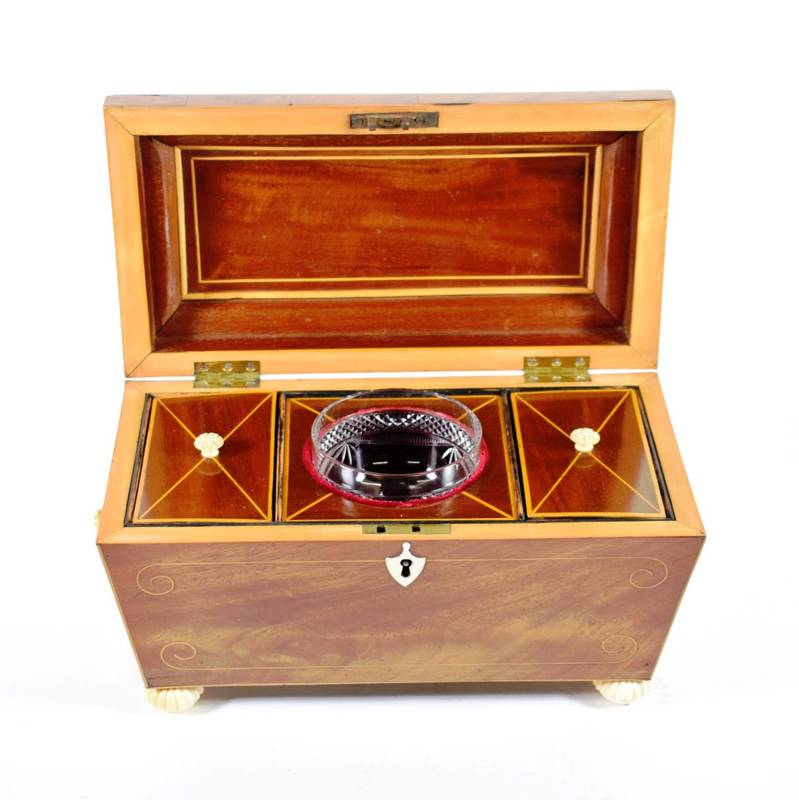 Lot 171 - A Regency Ivory Mounted Mahogany and Satinwood Banded Tea Caddy, of sarcophagus form with ring...