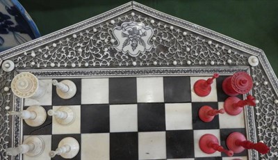 Lot 172 - A Vizagapatam Natural and Stained Ivory Miniature Games Table, mid 19th century, of octagonal...