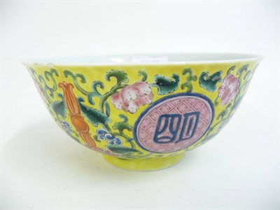 Lot 259 - A Chinese Porcelain Bowl, painted in famille rose enamels with characters in circular brocade...