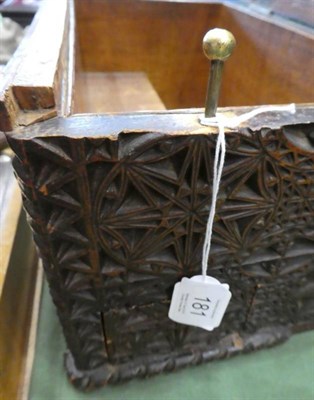 Lot 181 - A Chip Carved Oak Casket, in 17th century style, the hinged sloping top enclosing a gilt metal coat