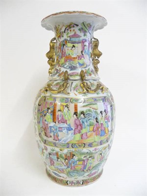 Lot 265 - A Cantonese Porcelain Baluster Vase, 19th century, with everted frilled rim and mythical beast...