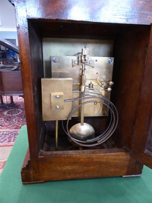 Lot 243 - A Walnut Quarter Striking Table Clock, retailed by W Kibble, 22 Gracechurch Street, London,...