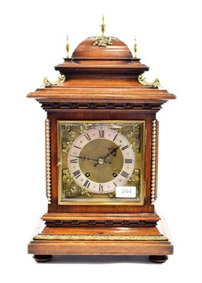 Lot 244 - A Walnut Quarter Striking Table Clock, later 19th century, caddied pediment with applied gilt metal
