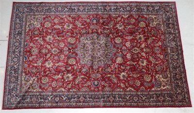 Lot 262 - Large Isfahan Carpet Central Iran, circa 1970 The terracotta field of scrolling floral vines around