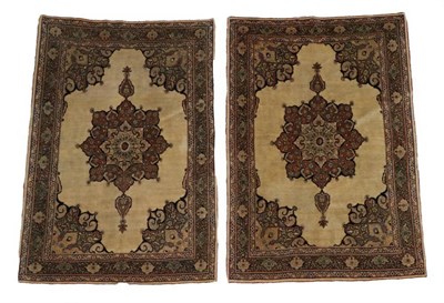 Lot 266 - Rare Pair of Tabriz Rugs Iranian Azerbaijan, circa 1900 Each with a cream field centred by a flower