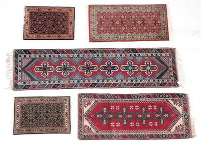 Lot 272 - ~ Narrow Dosemalti Runner West Turkey, modern The crimson field with a row of cruciform...