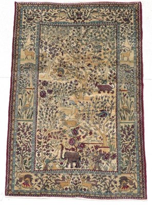 Lot 276 - Unusual Isfahan Part Silk Rug Central Iran, circa 1920 The field with wild beasts in a wooded...